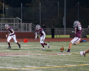 A group of young men playing a game of football